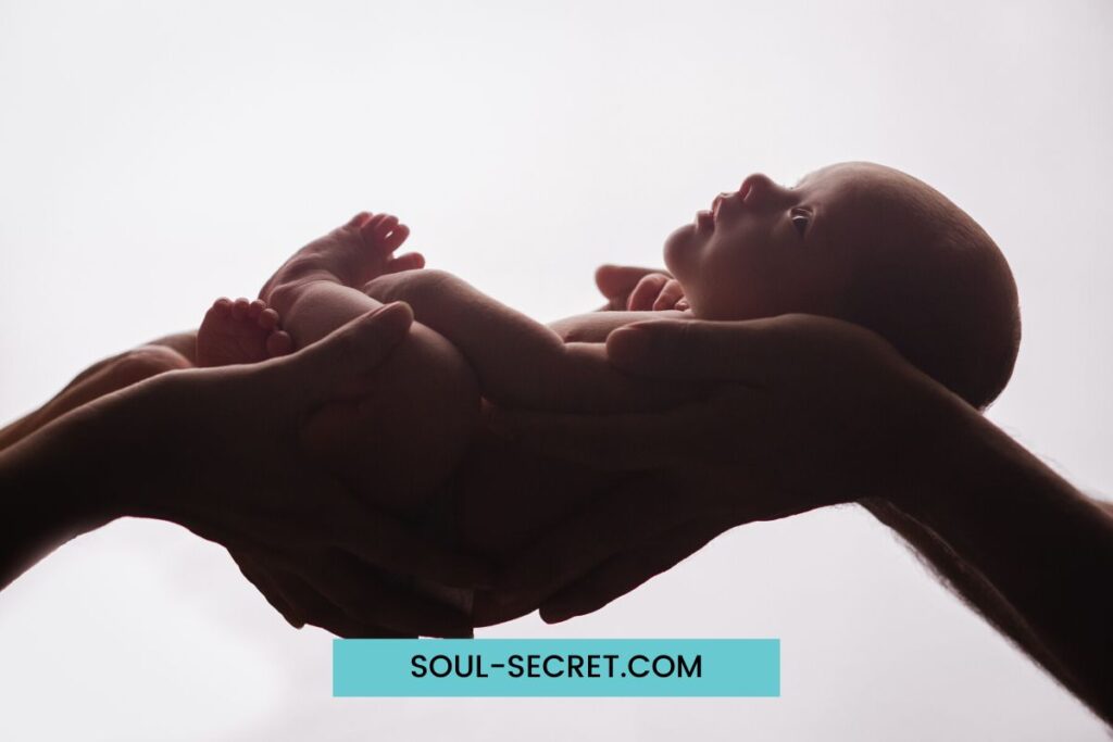 spiritual meaning of umbilical cord around a baby's neck